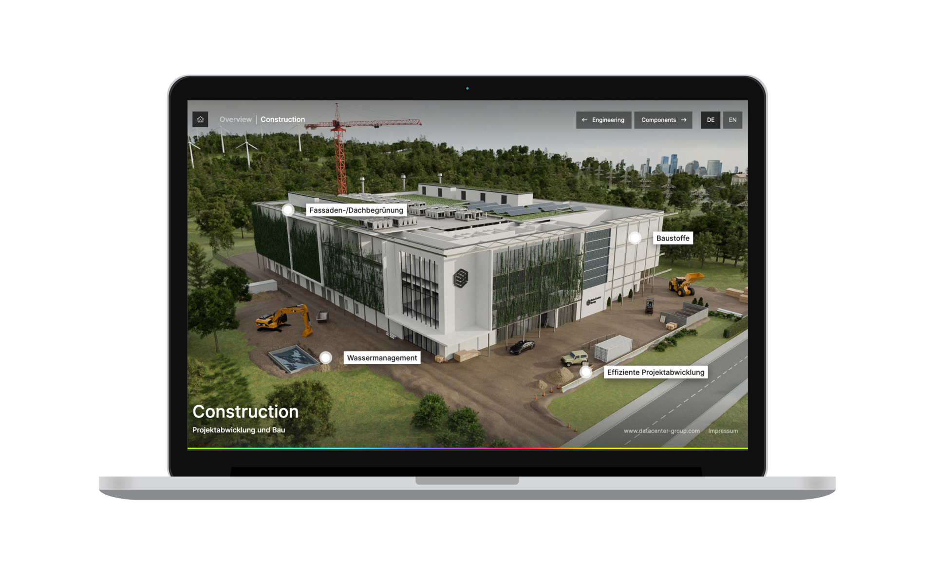 Laptop mit Bildschirm auf dem eine interaktive Anwendung zum Anklicken mit dem Bild eines Rechenzentrums zu sehen ist