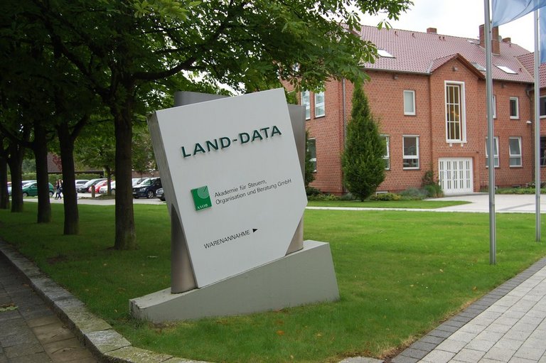 Land Data outside on a sign