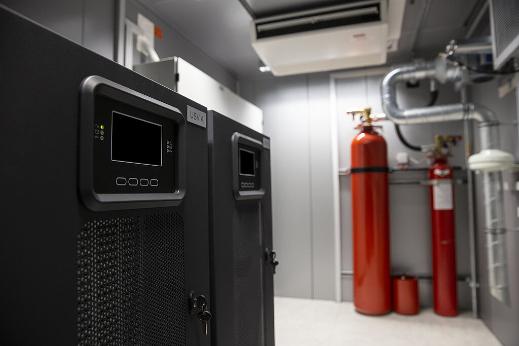 Data center with fire extinguishers