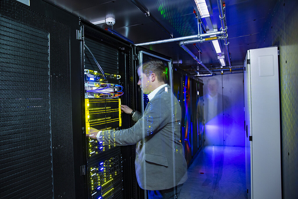 the CEO of EPAY in the data center, side view