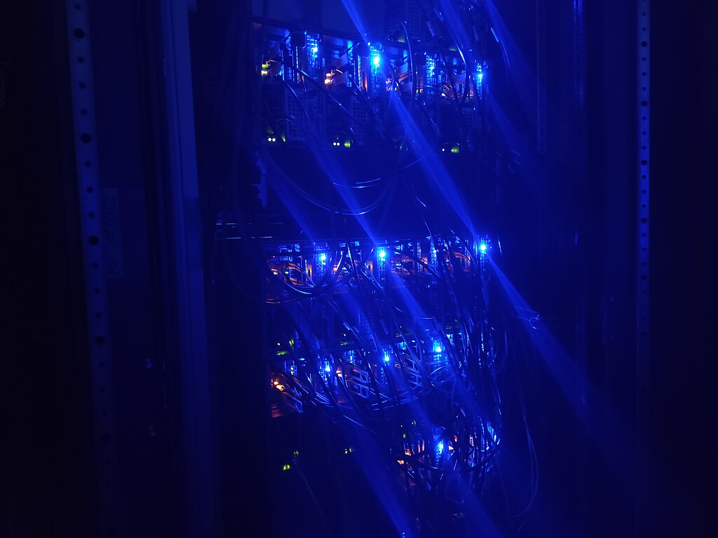 Server rack illuminated in blue