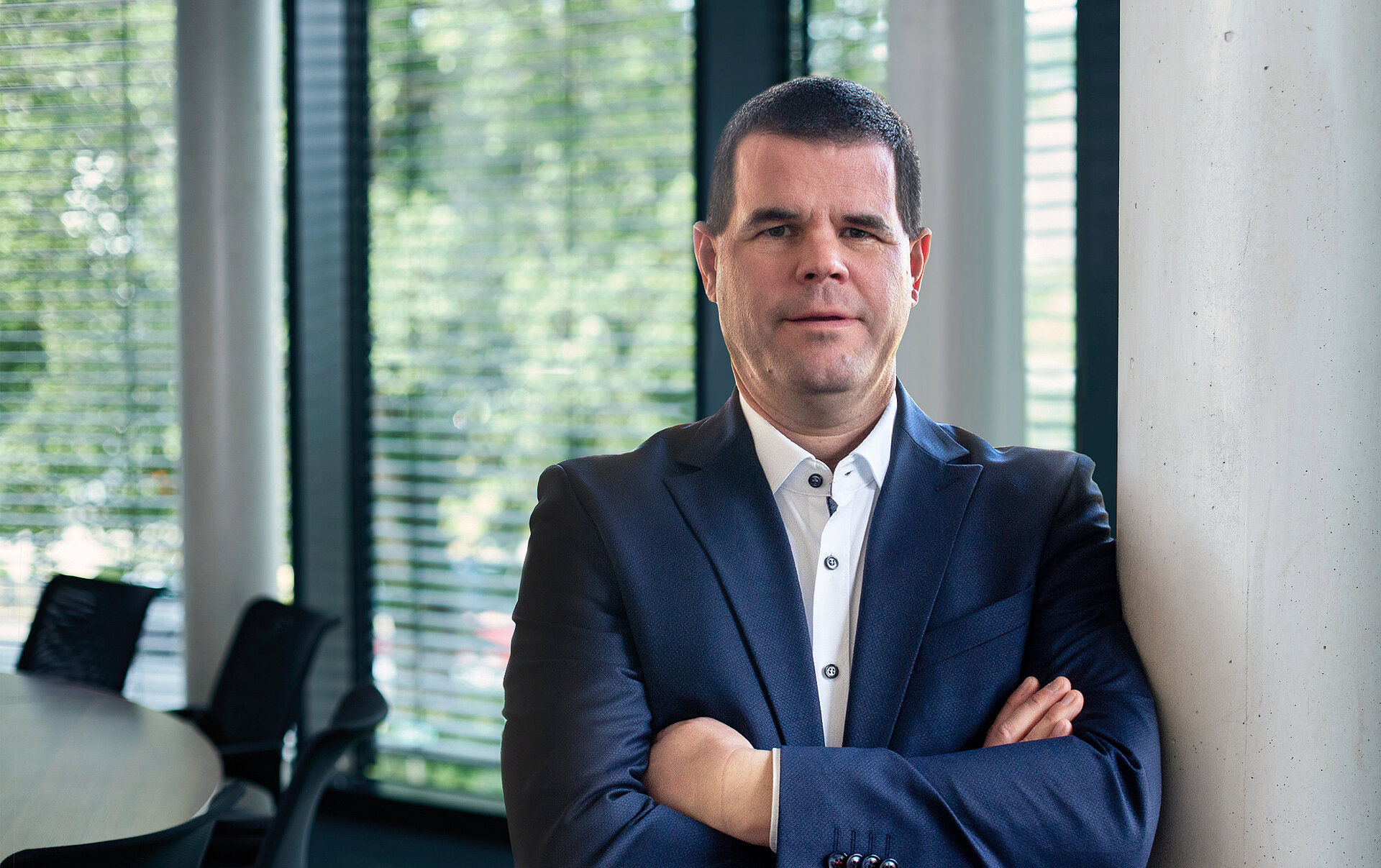 Markus Böhmer, CTO Data Center Group, with crossed arms