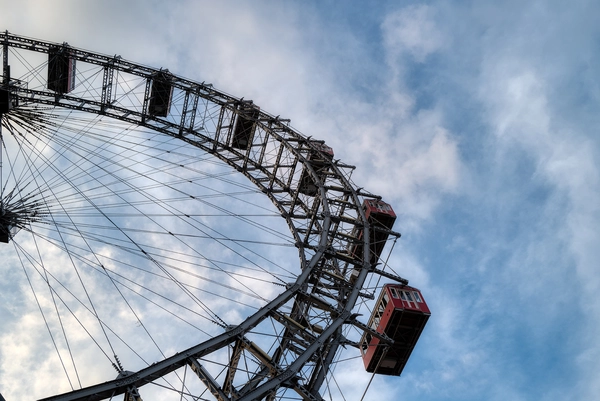 The Vienna Prater (Ferris wheel) against a blue sky with clouds