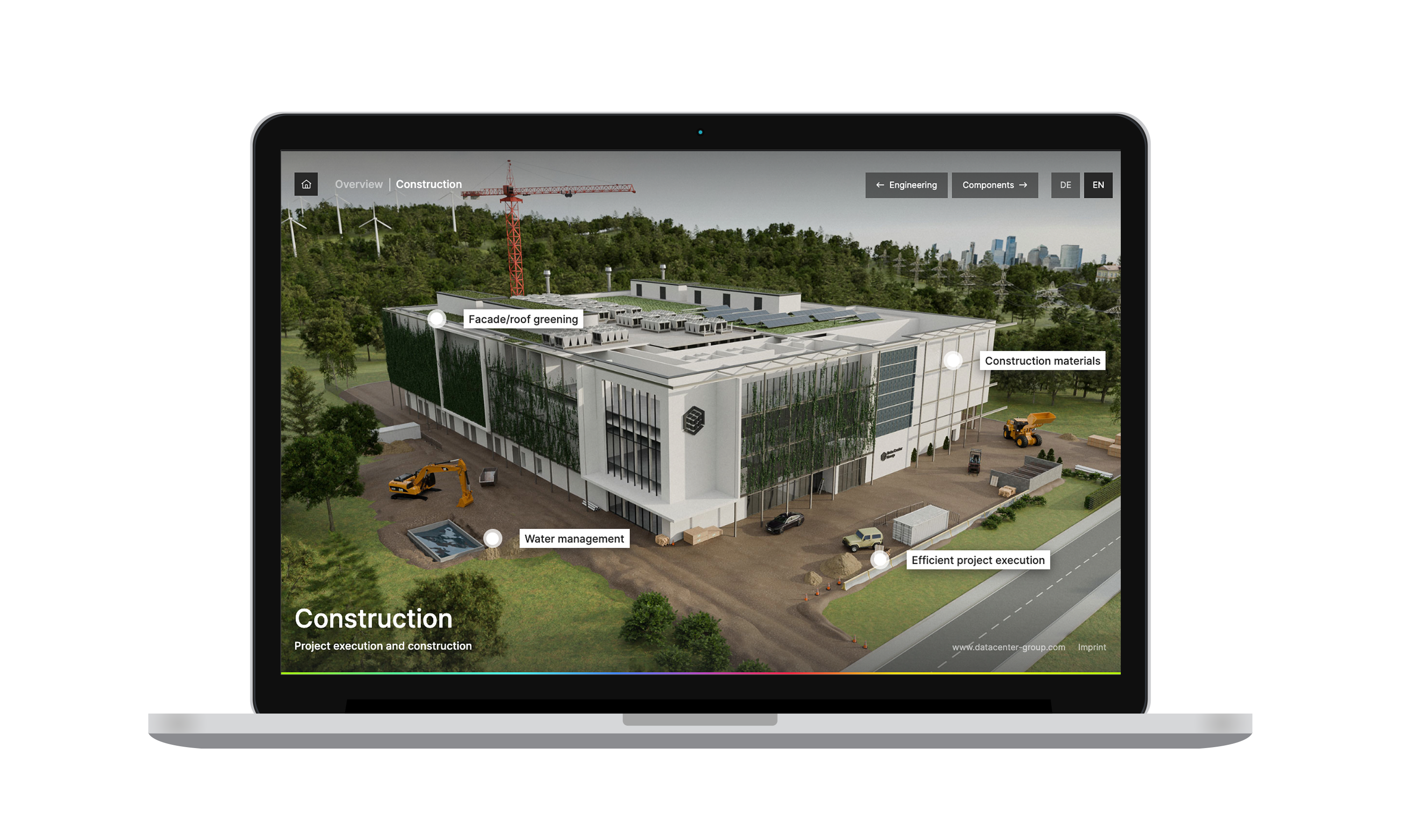Laptop with screen showing an interactive application to click on with the image of a data center