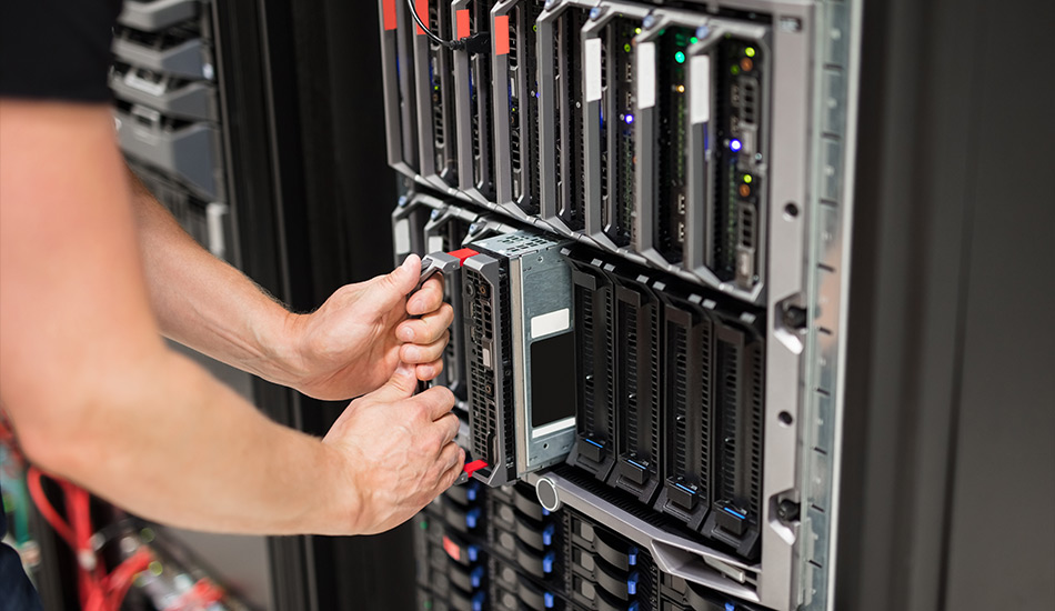 Man pulling server rack with his hands